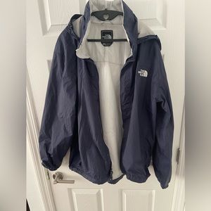 Men’s Navy North Face rain jacket with tuck-able hood